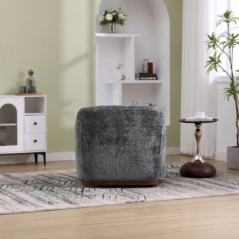 Un fauteuil de relaxation pivotant en tissu chenille, doté d'une assise confortable et d'une base robuste.