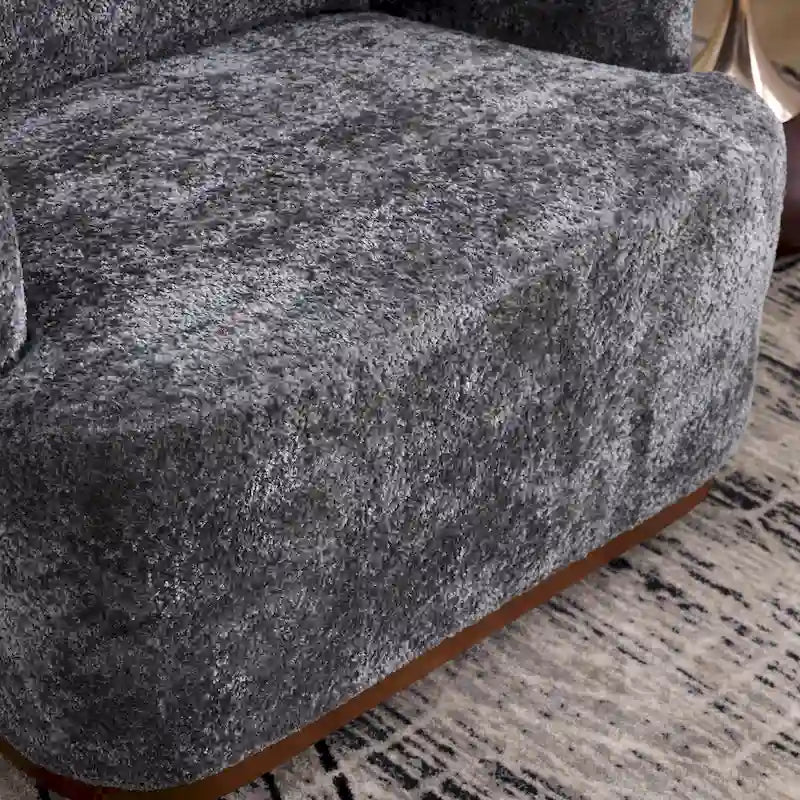 Un fauteuil de relaxation pivotant en tissu chenille, doté d'une assise confortable et d'une base robuste.
