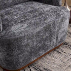 Un fauteuil de relaxation pivotant en tissu chenille, doté d'une assise confortable et d'une base robuste.