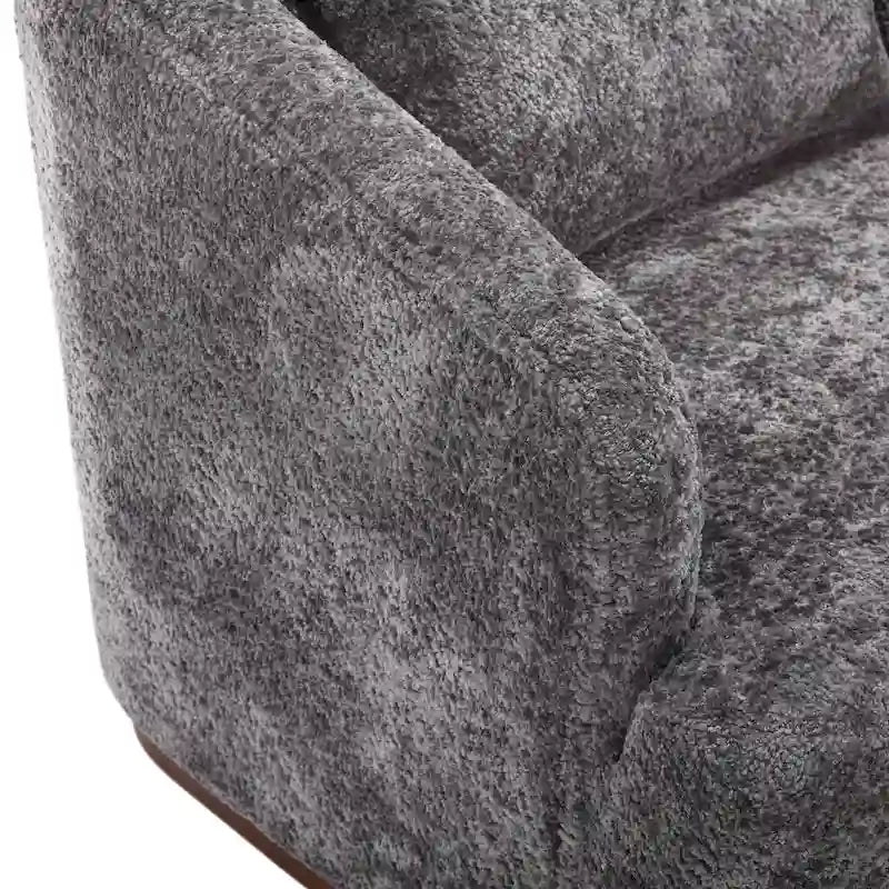 Un fauteuil de relaxation pivotant en tissu chenille, doté d'une assise confortable et d'une base robuste.