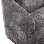 Un fauteuil de relaxation pivotant en tissu chenille, doté d'une assise confortable et d'une base robuste.