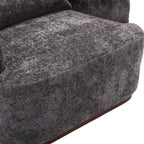 Un fauteuil de relaxation pivotant en tissu chenille, doté d'une assise confortable et d'une base robuste.