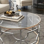 Table basse ronde ouverte plaquée or chromée de style moderne